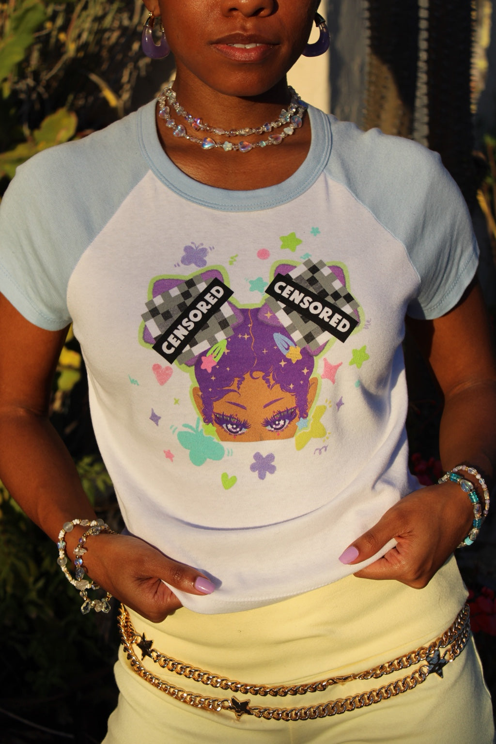 Close-up of the CENSORED tee with blue sleeves